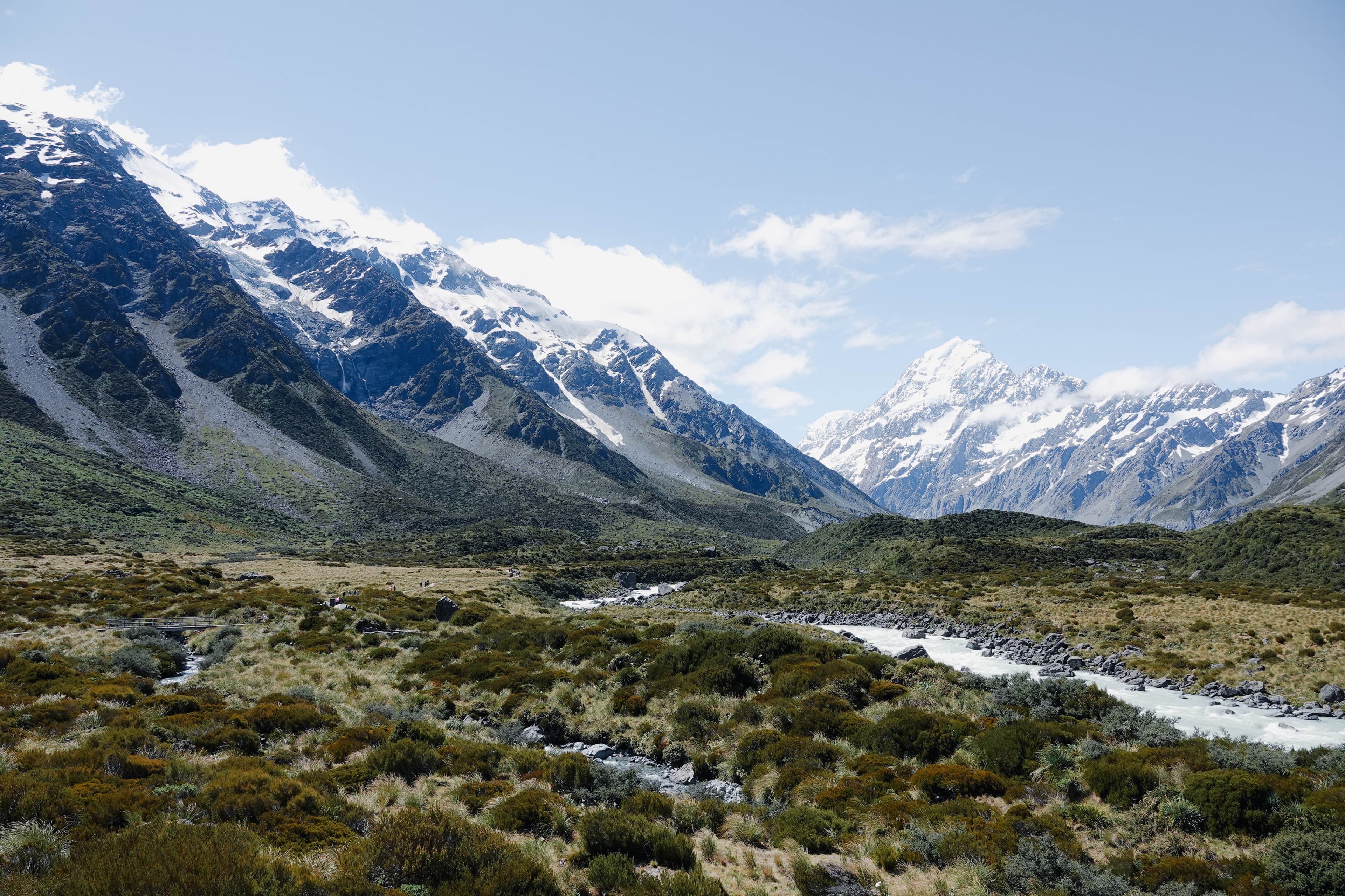 Scenic view of Hooker Valley Track with mountains in the background